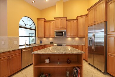 The kitchen also features an island, allowing for 