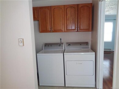 Both washer and dryer convey.  Utility area off of