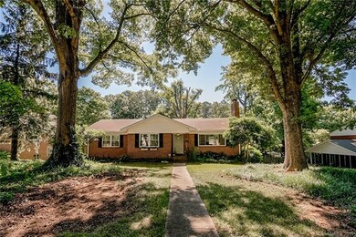Welcome to this charming brick ranch home with a b