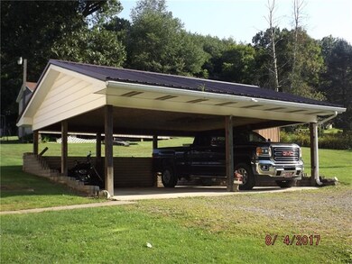 Well done Car port has 2 1/2 car space. Ceiling is