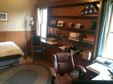 Its a bedroom, but warm and bright as an office.
