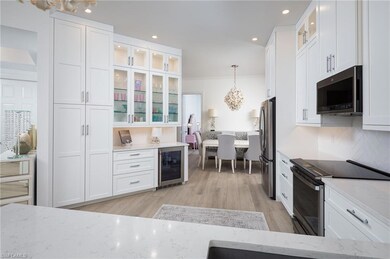 815 Bentwater Cir unit 101, Naples, FL 34108 - photo 5