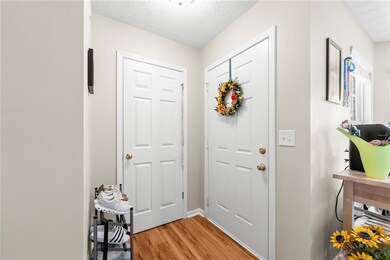 Foyer featuring light wood-style flooring