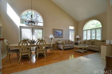 Formal living room and dining room with wood plant