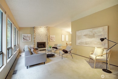 Living room with dining room entry on the right.