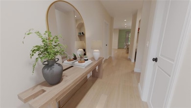 Hall with recessed lighting, light wood-style floo
