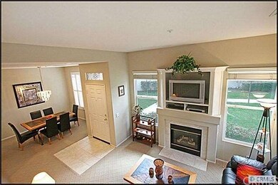 Living room & dining room with designer carpeting 