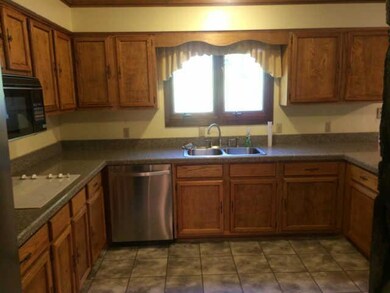 Granite counter tops with plenty of cooking space.