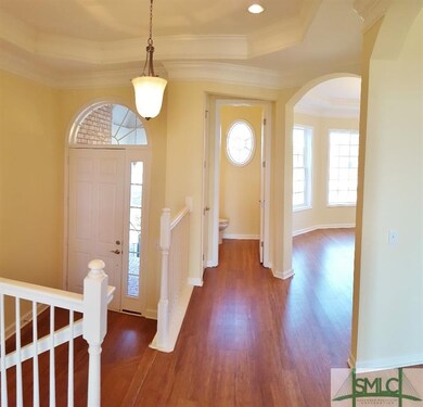 Front Entry landing-  to half bath and eat-in area