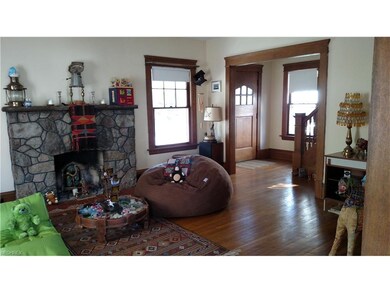Well used wood burning fireplace in this large living room.