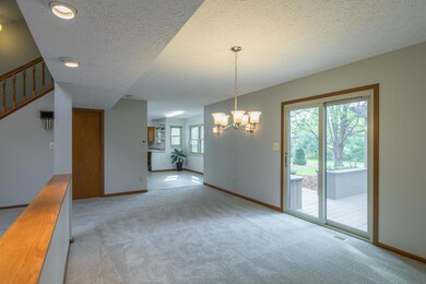 Dining rm w/ slider to backyard deck