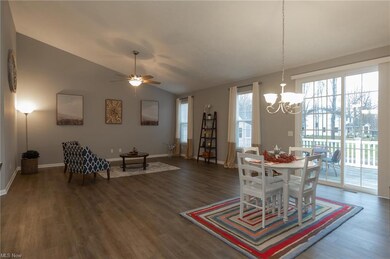 Great room and dining room with neutral color pall