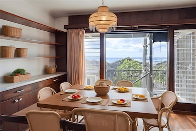 View is actual. Enhanced photo with virtual staging of the dining room area.