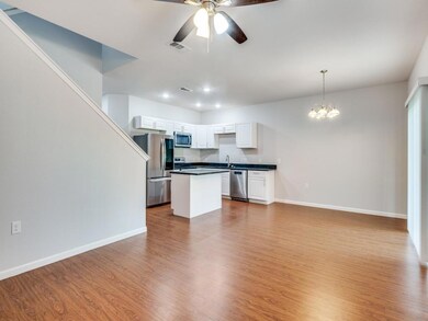 Kitchen with light hardwood / wood-style flooring,