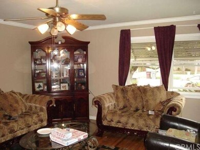 Cozy living room with plenty of natural light.