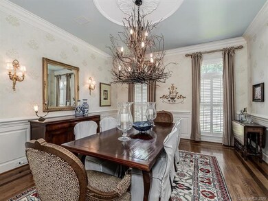 Dining Room Features High Ceilings & Heavy Molding