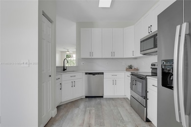 108 Lighthouse Cir unit E, Jupiter, FL 33469 - photo 4