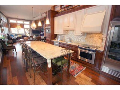 Awesome kitchen with beautiful grantie, glass tile