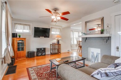 ~Enter the living area with hardwood flooring, neu