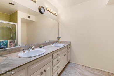 Well lit primary bath lit by skylight