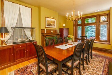 Beautiful dining room with window seat and preserv