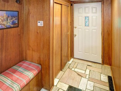 Entrance and guest coat closet.