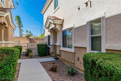 View of property exterior with fence and stucco si