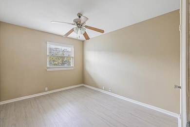 Fresh and airy upstairs bedroom with updated light