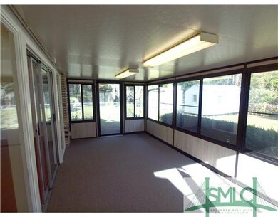 Other. The sunroom has glass windows that can open