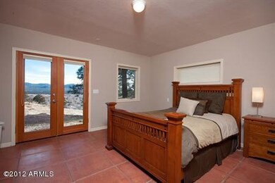 Master Bedroom w/door leading to patio