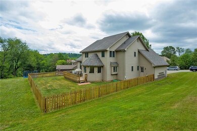 Side and Fenced Backyard view of 3327 Carriage Cir
