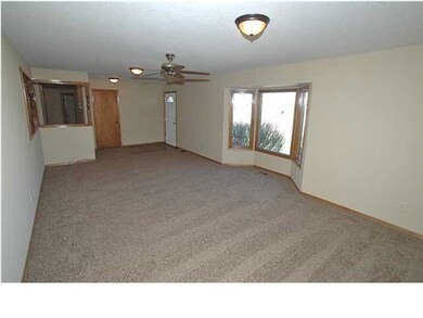 Living room with new carpet, paint this room measu