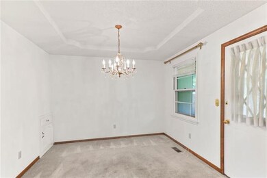 Dining room with lovely chandelier
