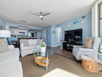 Living room featuring wood finished floors, a ceil