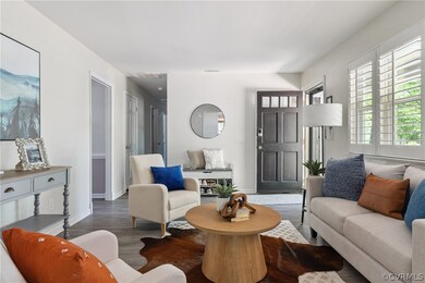 Living room with hardwood / wood-style floors