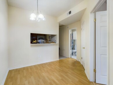 Unfurnished dining area with baseboards, a notabl
