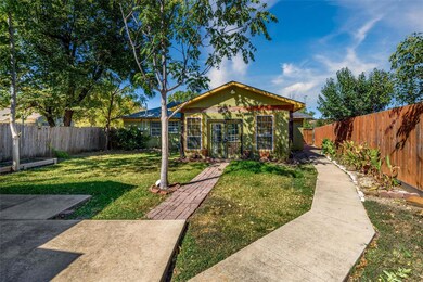 Single story home with a back yard