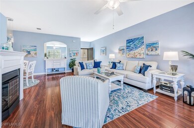 Living room featuring dark wood-type flooring and