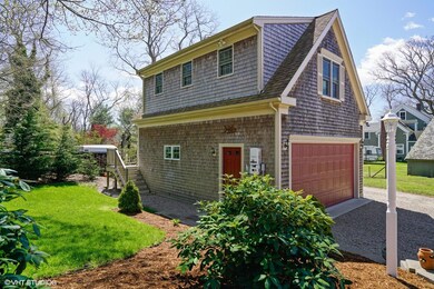 Garage with open loft above