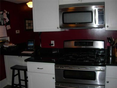 Kitchen. The eat-in kitchen has a 5 burner gas sto