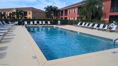 Community pool featuring a patio area