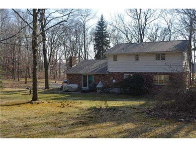 Exterior Back. GREAT HOME & YARD. PRIVATE SETTING.