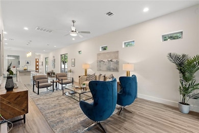 Living room with recessed lighting, wood finished