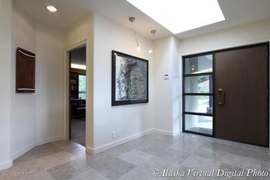 Foyer with bronze front door