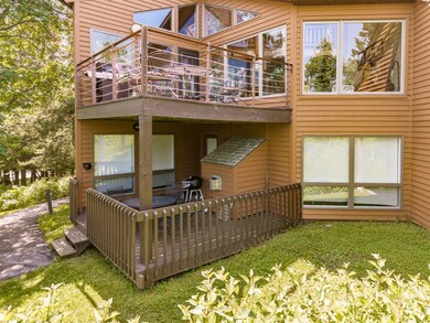 Back of property featuring a deck