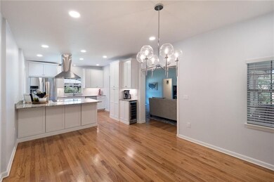 Flowing floorplan with dining room and kitchen opening to the main living area