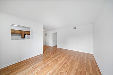 The spacious living area and dining area have Faux
