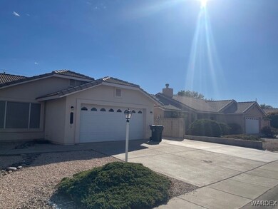 View of property exterior with a garage