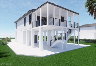 Rear view of house featuring stairs, a party patio