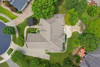 The property is outlined in mature trees and has a tranquil water feature. But, it also has plenty of room for play and the cul-de-sac location adds to the perfection.